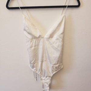 White satin body suit